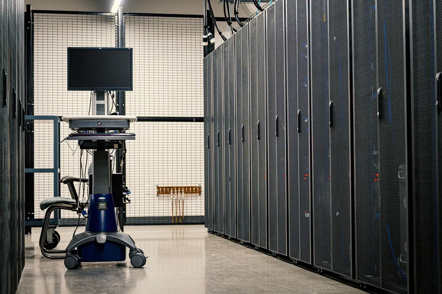 Rows of server racks in a clean server room